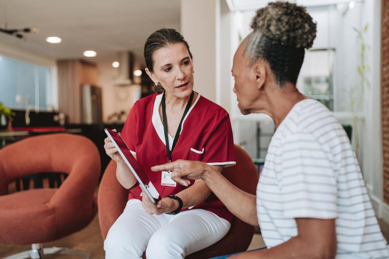 Patient receiving personalized care at home after hospital discharge