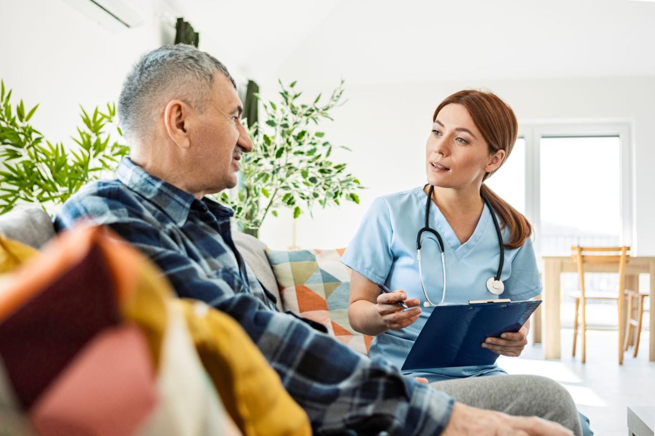 Healthcare professional providing additional care support in an assisted living facility