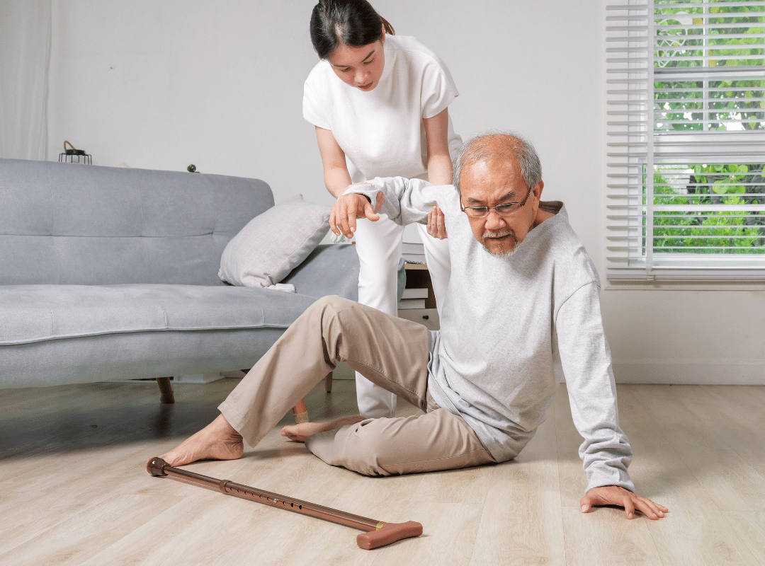 Caregiver supporting an older adult walking safely at home
