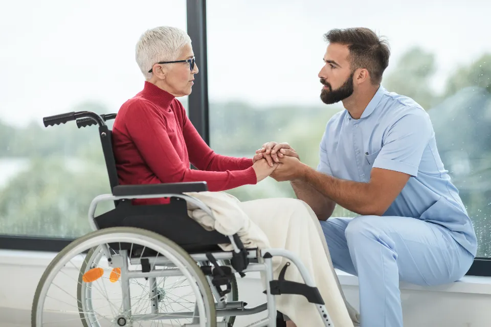 Caregiver supporting a senior at home