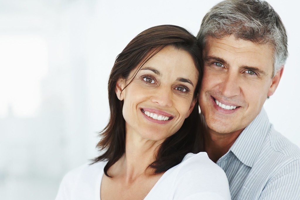 A mature couple sharing a warm, companionable moment together